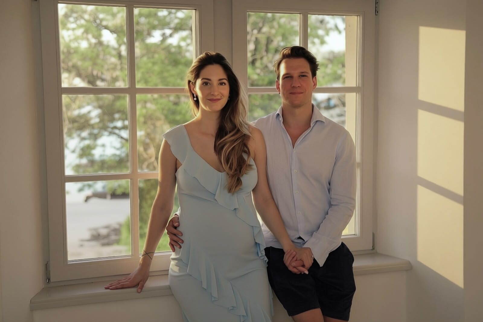 Dorka and Marcell, the founders of Lumi House, by a bright window